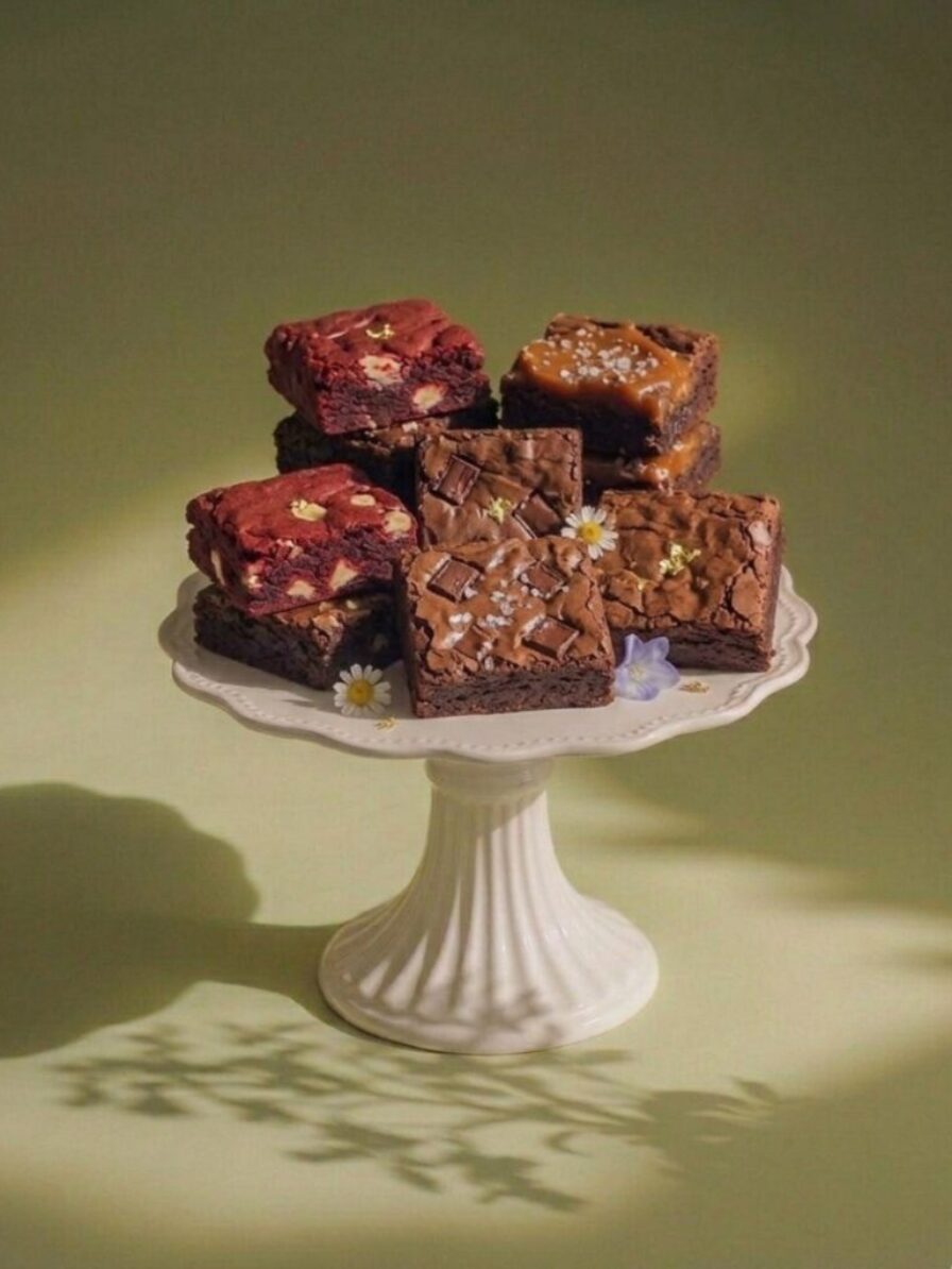 Indulge in our two signature : classic fudgy chocolate and ,cream-cheese swirled Red Velvet.